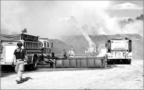 Firefighters battle mulch pile blaze - Hope Valley Wyoming Fire District